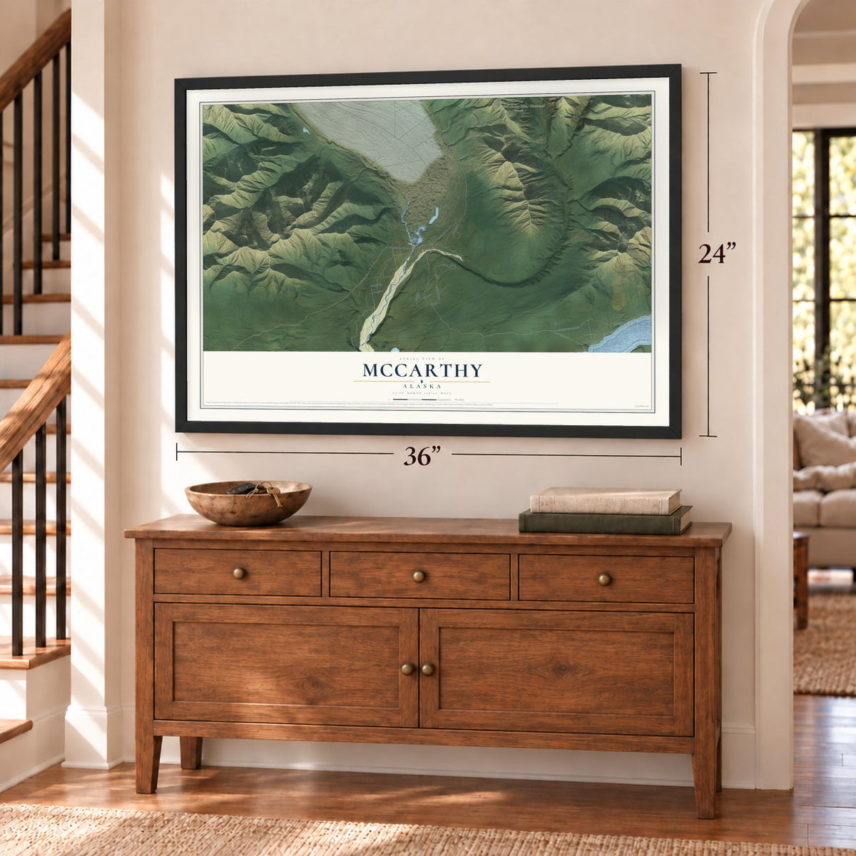 McCarthy, Alaska map, 24 x 36 inch print in a black frame above a dresser by a staircase