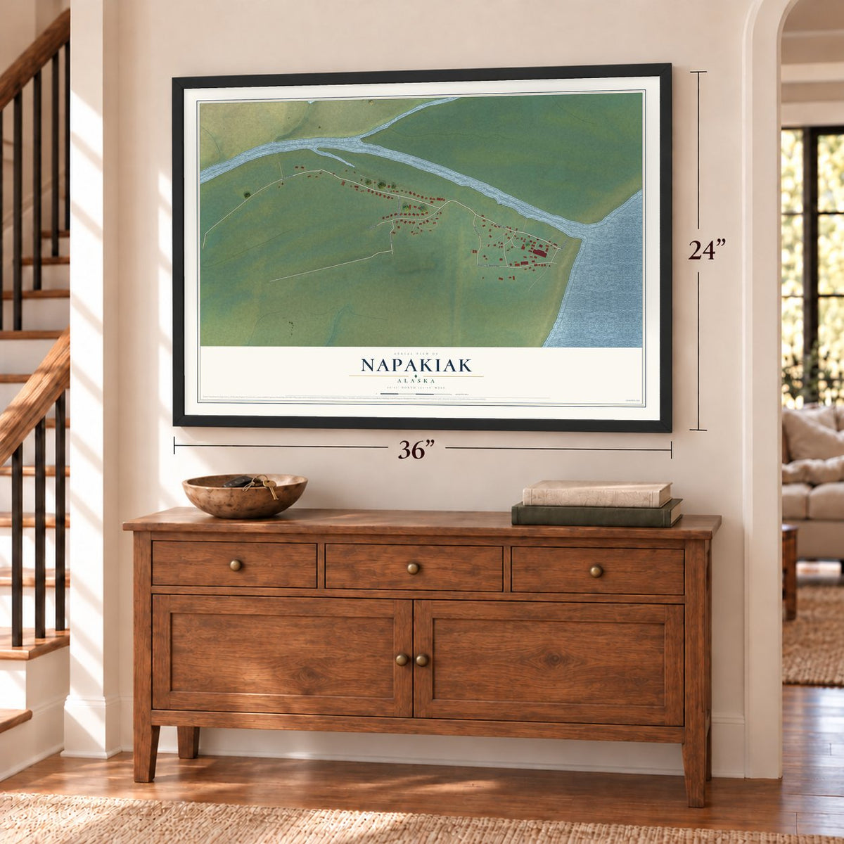 Napakiak, Alaska map, 24 x 36 inch print in a black frame above a dresser by a staircase