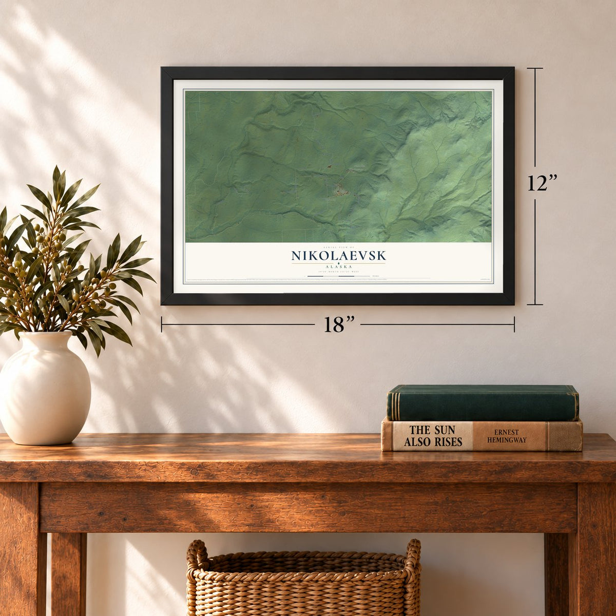 Nikolaevsk, Alaska map, 12 x 18 inch print in a black frame in an entryway