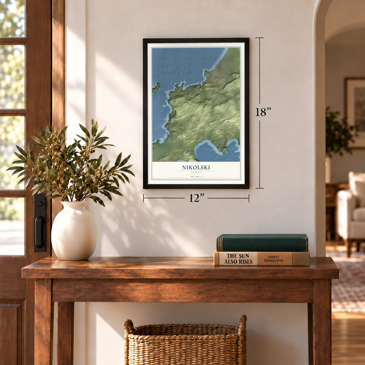 Nikolski, Alaska map, 12 x 18 inch print in a black frame in an entryway