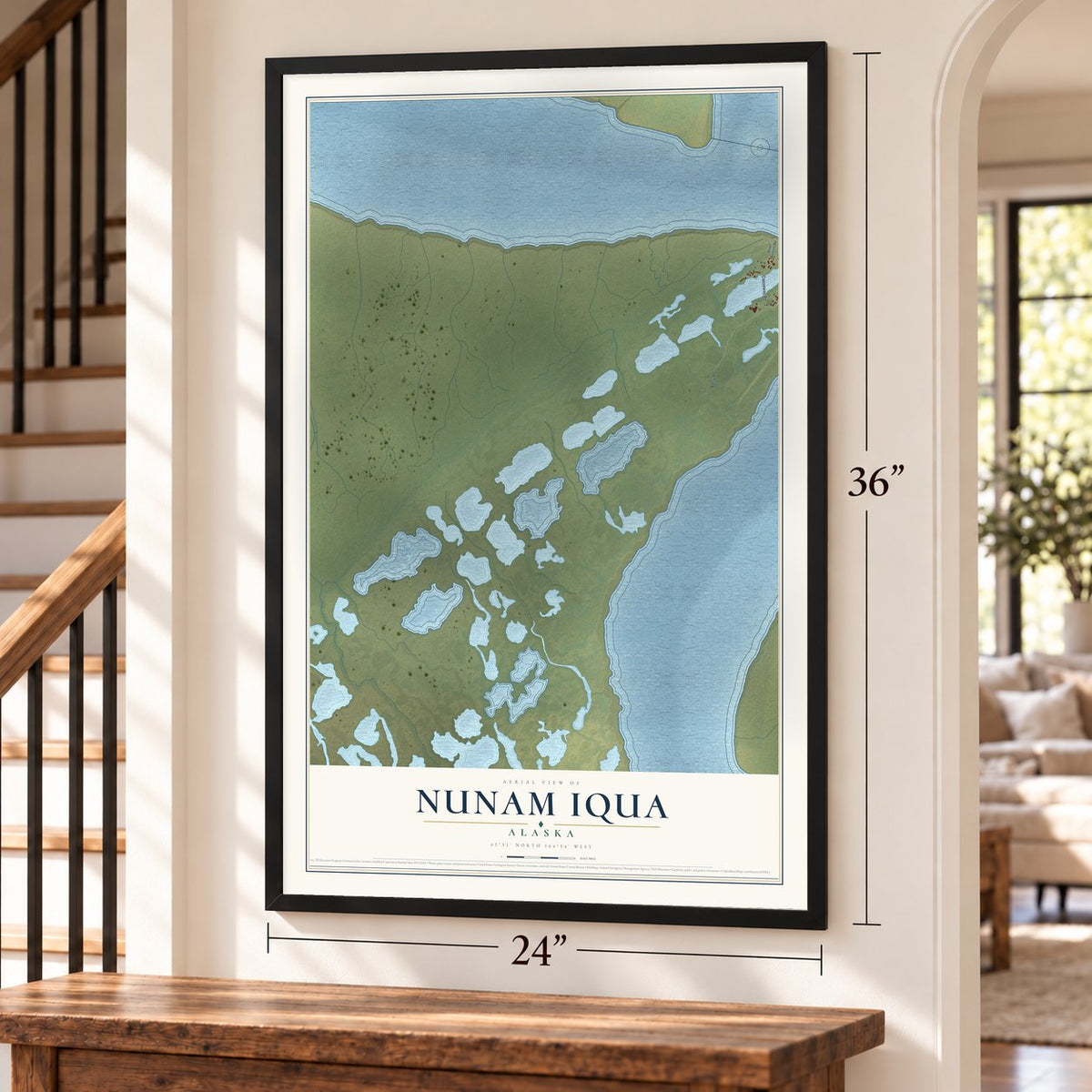 Nunam Iqua, Alaska map, 24 x 36 inch print in a black frame by a staircase