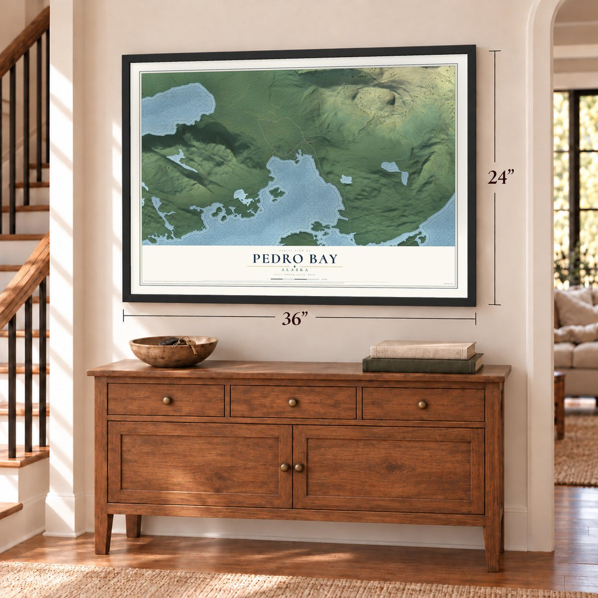 Pedro Bay, Alaska map, 24 x 36 inch print in a black frame above a dresser by a staircase