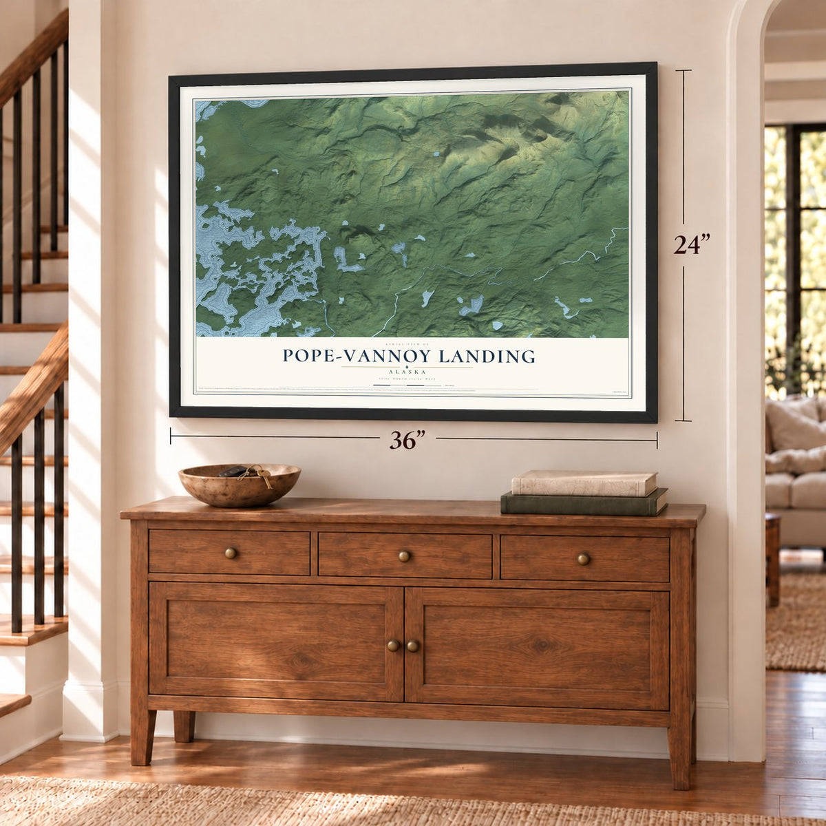 Pope-Vannoy Landing, Alaska map, 24 x 36 inch print in a black frame above a dresser by a staircase