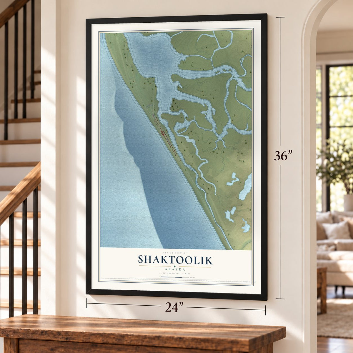 Shaktoolik, Alaska map, 24 x 36 inch print in a black frame by a staircase