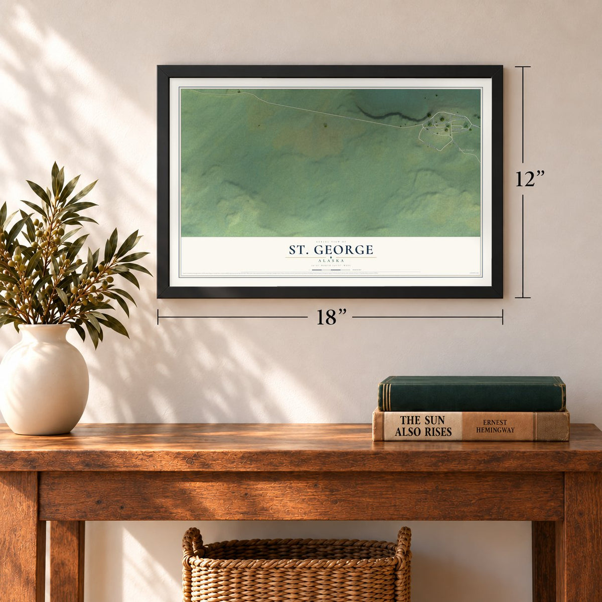 St. George, Alaska map, 12 x 18 inch print in a black frame in an entryway