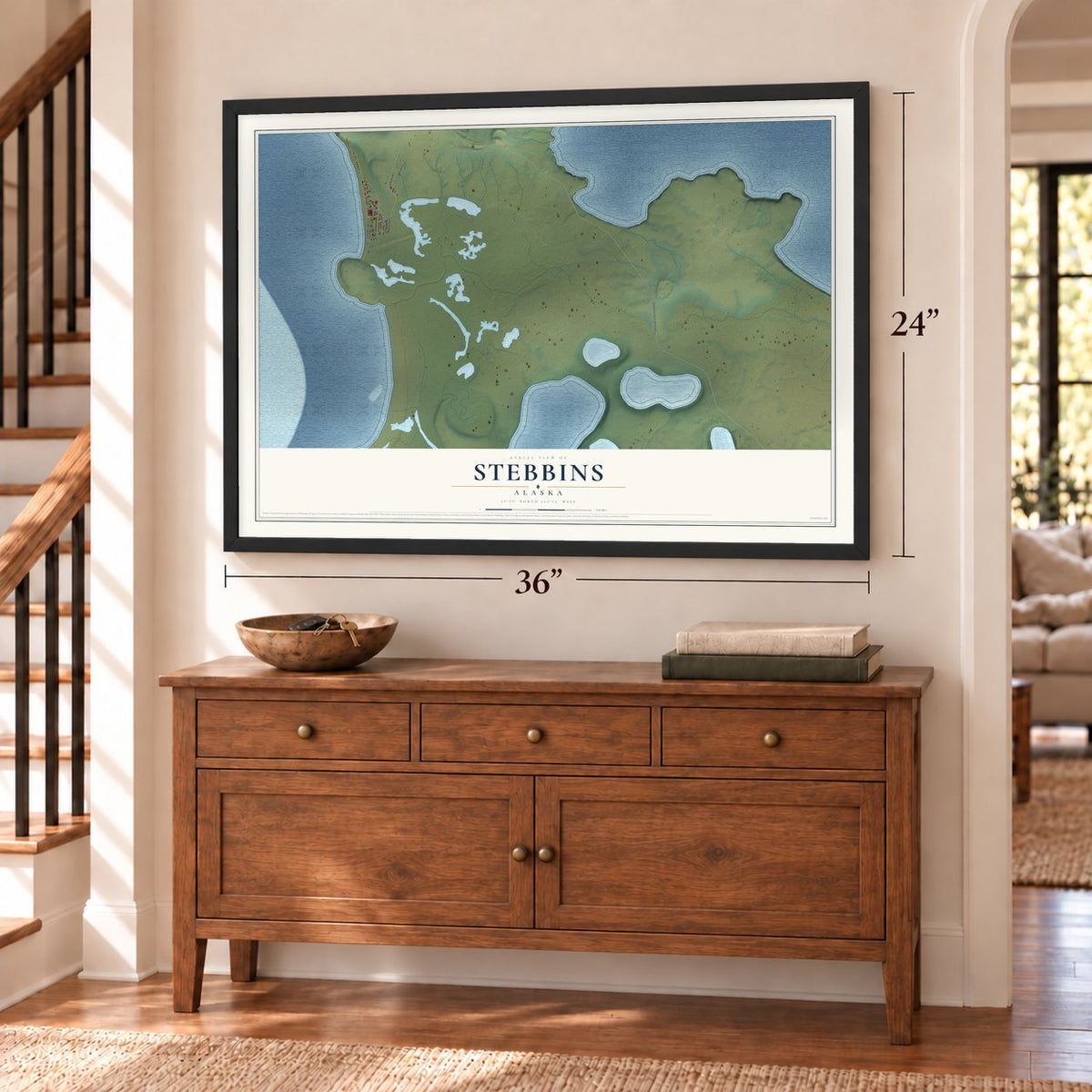 Stebbins, Alaska map, 24 x 36 inch print in a black frame above a dresser by a staircase
