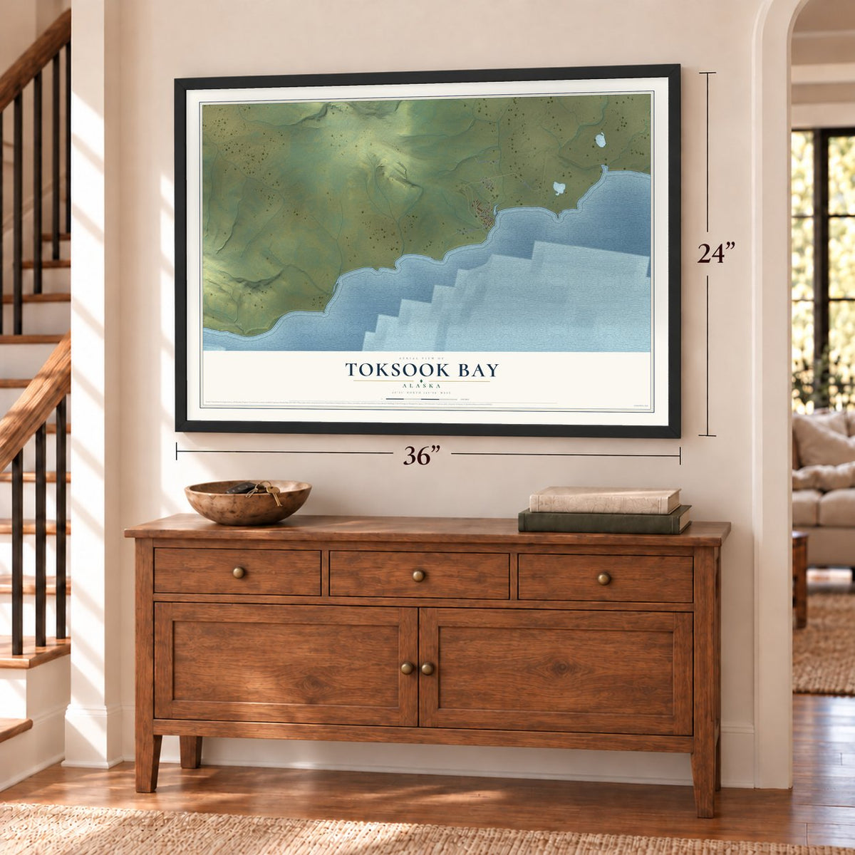 Toksook Bay, Alaska map, 24 x 36 inch print in a black frame above a dresser by a staircase