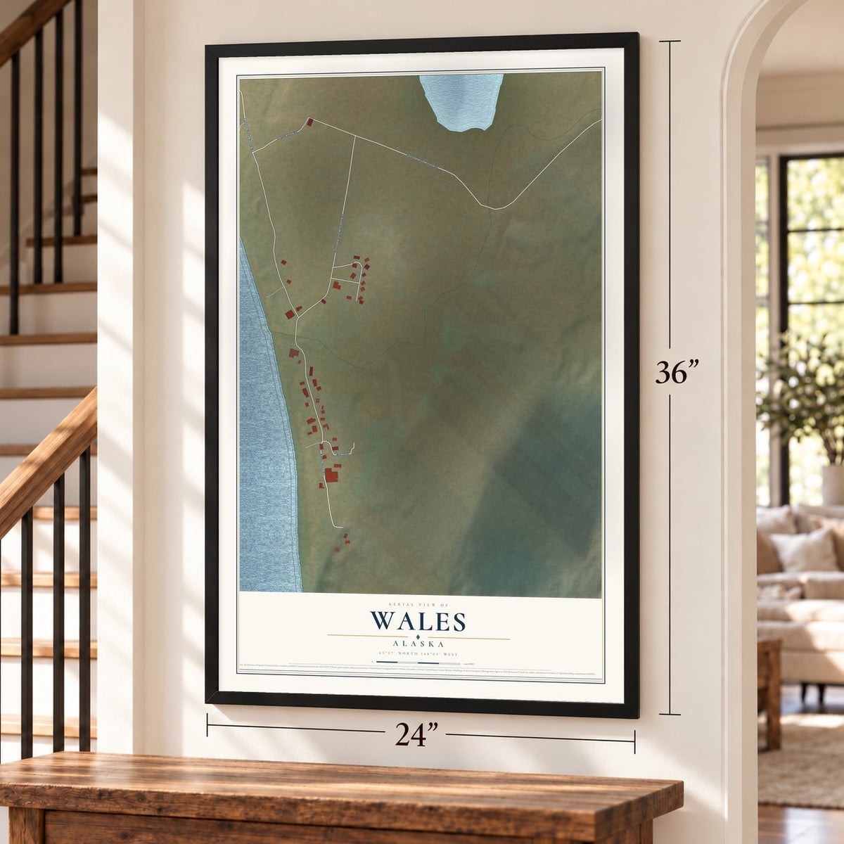 Wales, Alaska map, 24 x 36 inch print in a black frame by a staircase