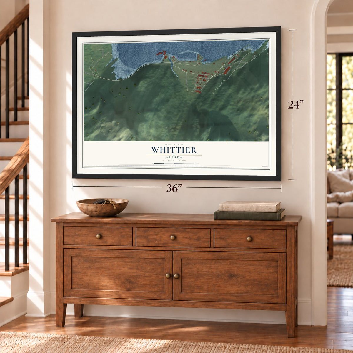 Whittier, Alaska map, 24 x 36 inch print in a black frame above a dresser by a staircase