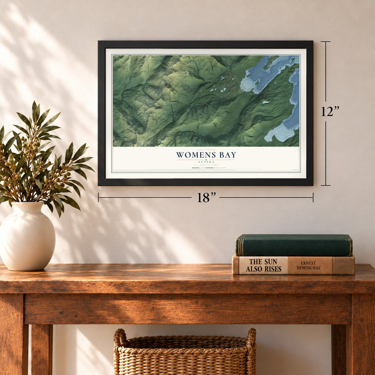 Womens Bay, Alaska map, 12 x 18 inch print in a black frame in an entryway