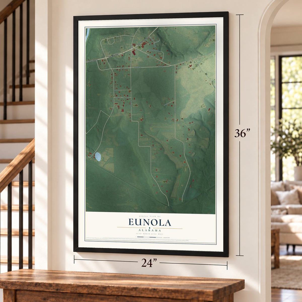 Eunola, Alabama map, 24 x 36 inch print in a black frame by a staircase