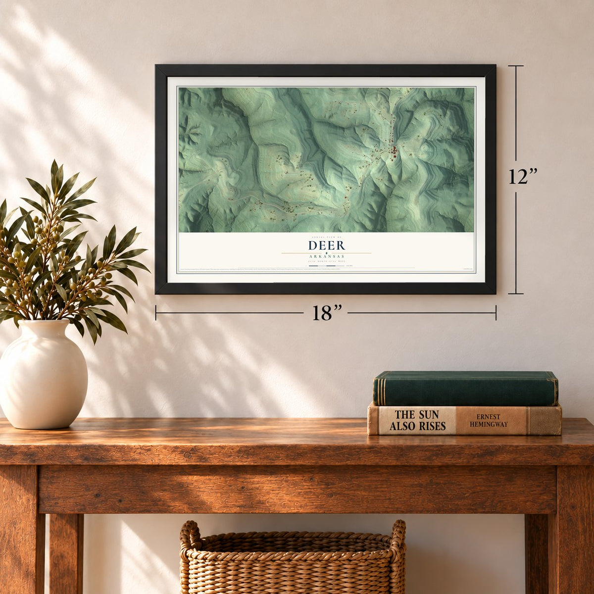 Deer, Arkansas map, 12 x 18 inch print in a black frame in an entryway