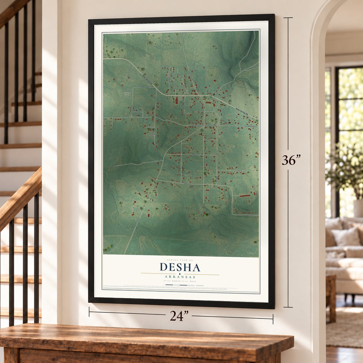Desha, Arkansas map, 24 x 36 inch print in a black frame by a staircase