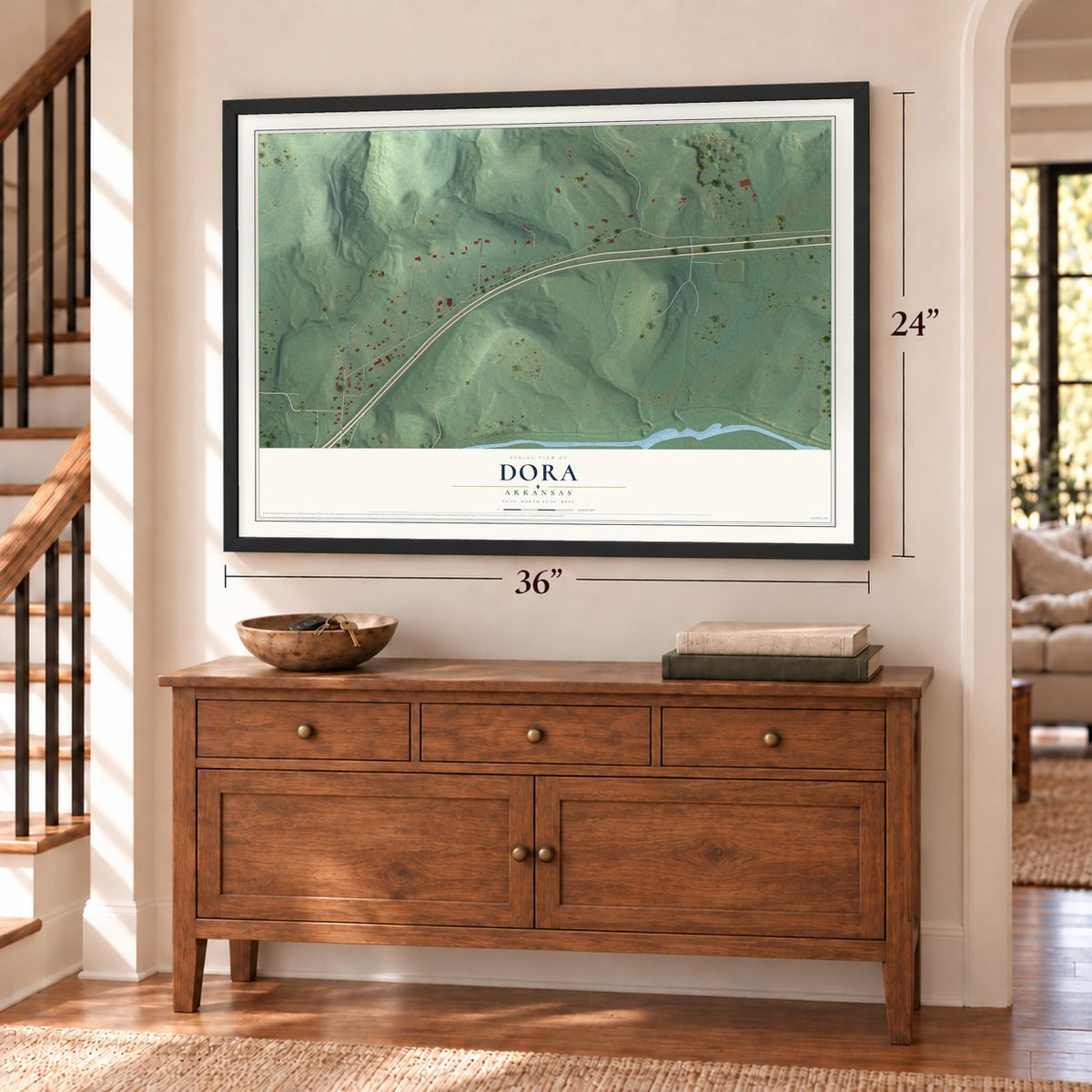 Dora, Arkansas map, 24 x 36 inch print in a black frame above a dresser by a staircase