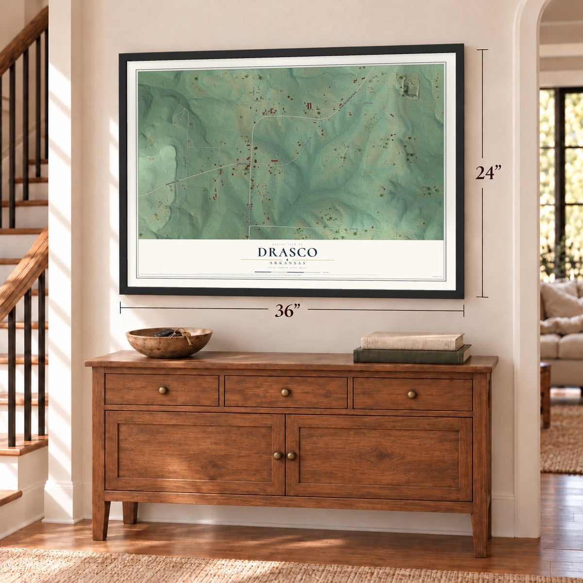 Drasco, Arkansas map, 24 x 36 inch print in a black frame above a dresser by a staircase