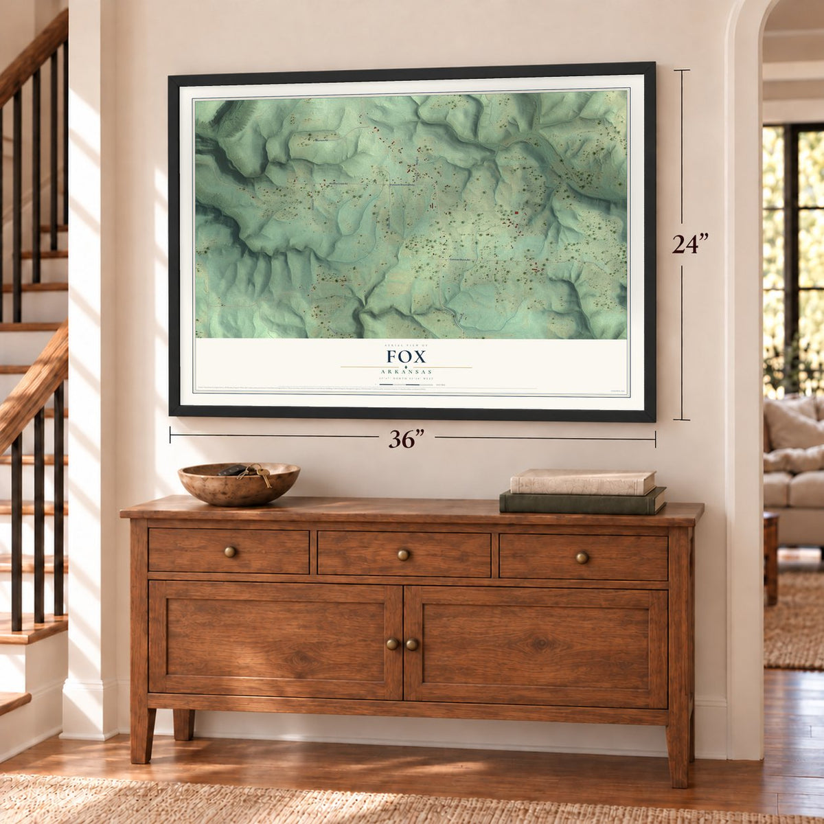 Fox, Arkansas map, 24 x 36 inch print in a black frame above a dresser by a staircase