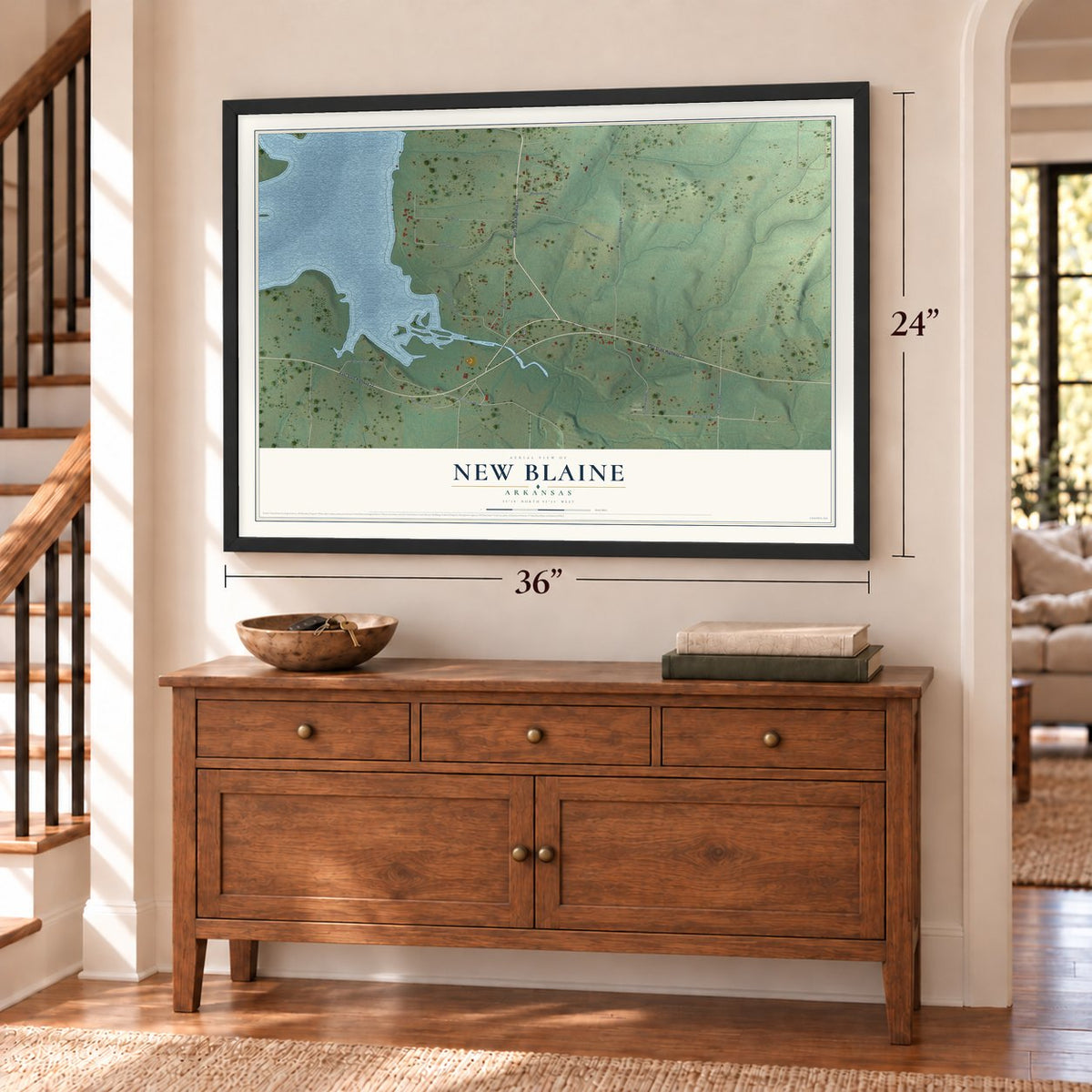 New Blaine, Arkansas map, 24 x 36 inch print in a black frame above a dresser by a staircase