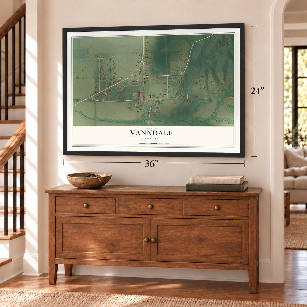Vanndale, Arkansas map, 24 x 36 inch print in a black frame above a dresser by a staircase