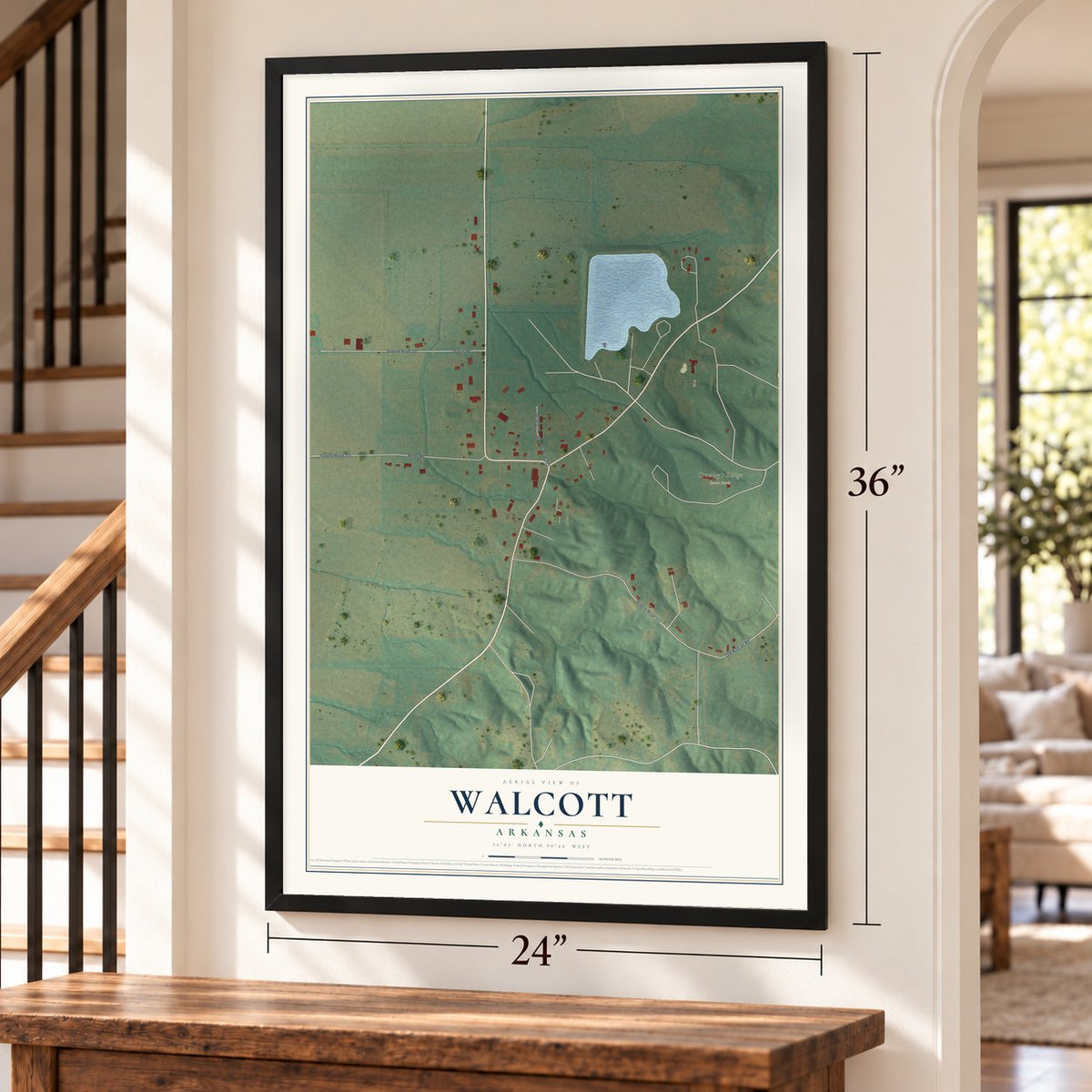 Walcott, Arkansas map, 24 x 36 inch print in a black frame by a staircase
