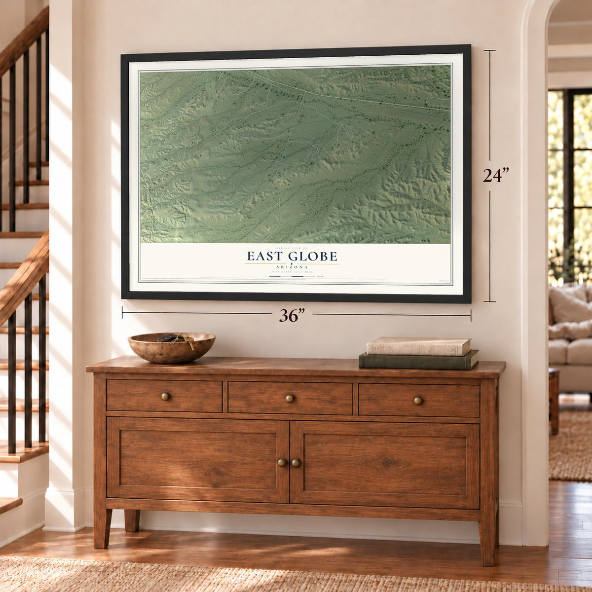 East Globe, Arizona map, 24 x 36 inch print in a black frame above a dresser by a staircase