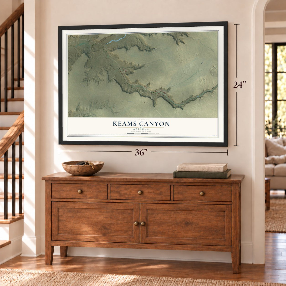 Keams Canyon, Arizona map, 24 x 36 inch print in a black frame above a dresser by a staircase