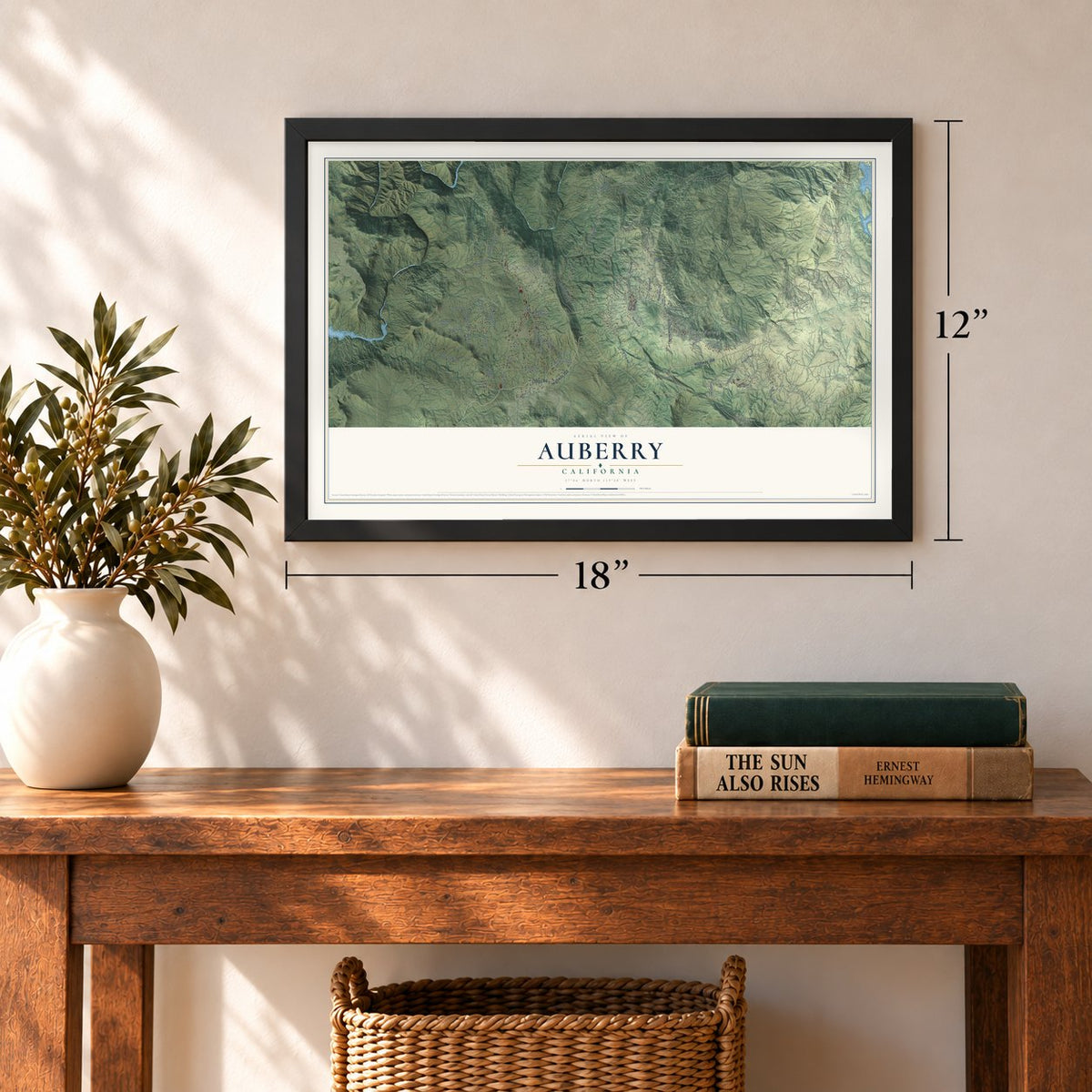 Auberry, California map, 12 x 18 inch print in a black frame in an entryway