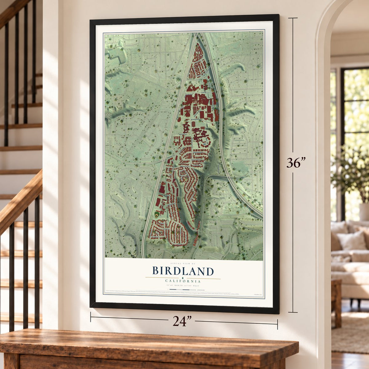 Birdland, California map, 24 x 36 inch print in a black frame by a staircase