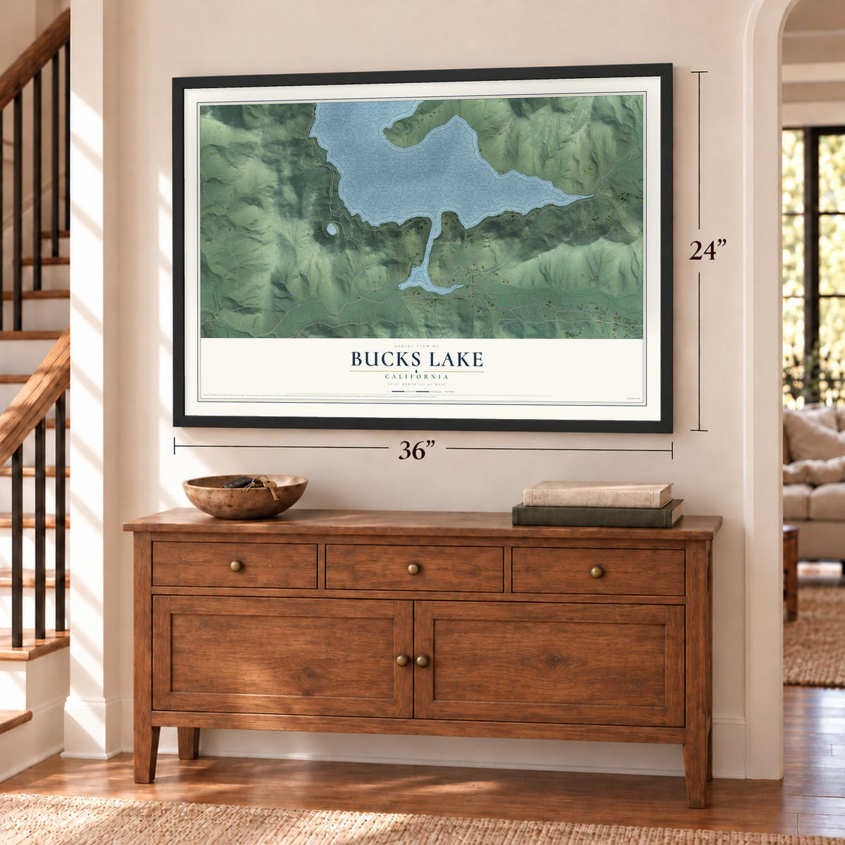 Bucks Lake, California map, 24 x 36 inch print in a black frame above a dresser by a staircase