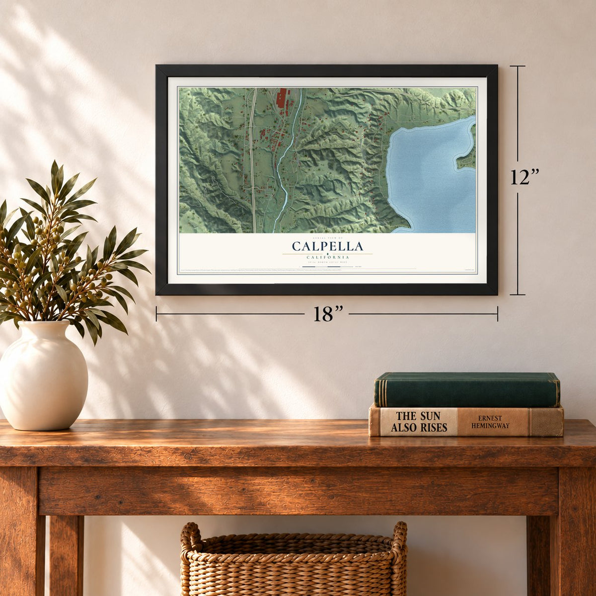 Calpella, California map, 12 x 18 inch print in a black frame in an entryway