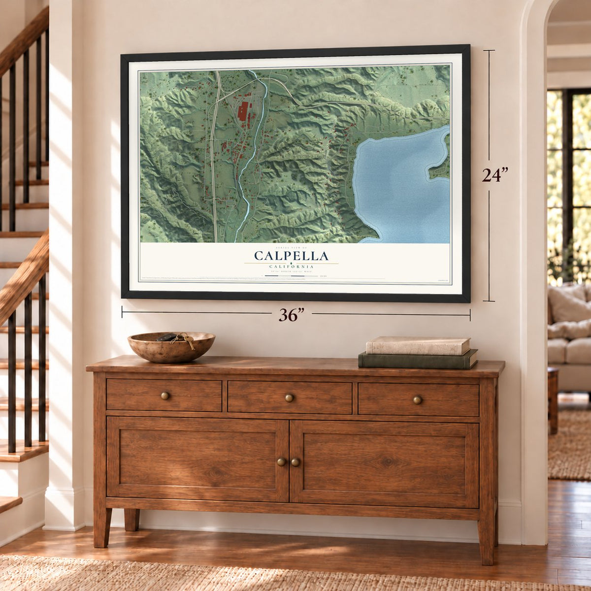 Calpella, California map, 24 x 36 inch print in a black frame above a dresser by a staircase