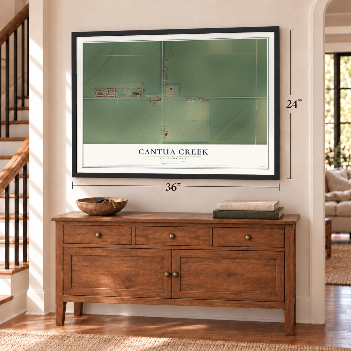 Cantua Creek, California map, 24 x 36 inch print in a black frame above a dresser by a staircase