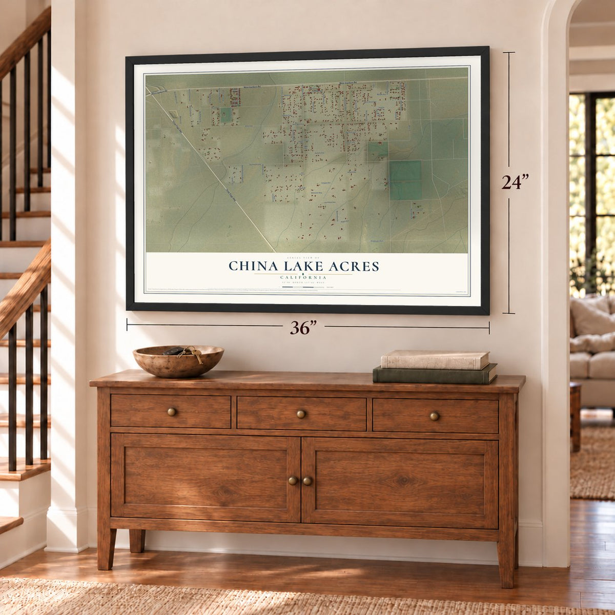 China Lake Acres, California map, 24 x 36 inch print in a black frame above a dresser by a staircase