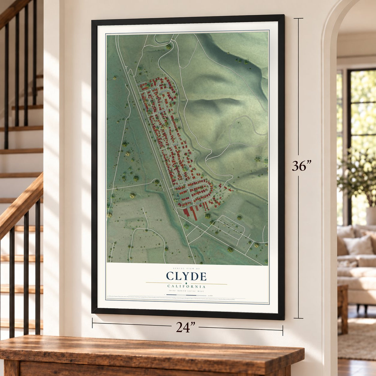 Clyde, California map, 24 x 36 inch print in a black frame by a staircase