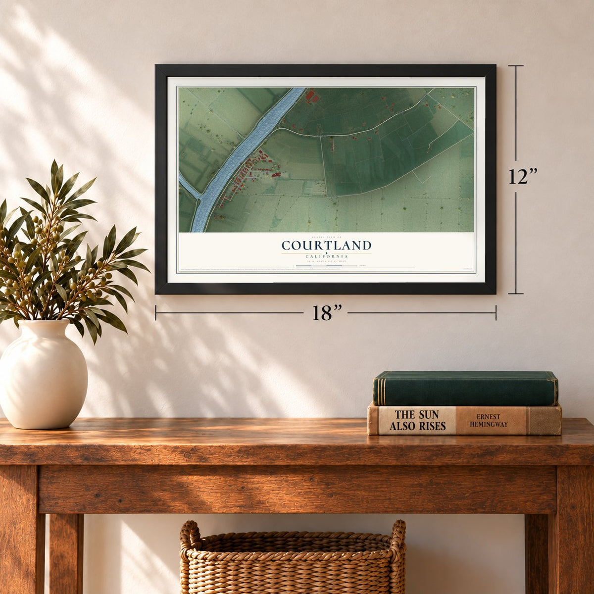 Courtland, California map, 12 x 18 inch print in a black frame in an entryway