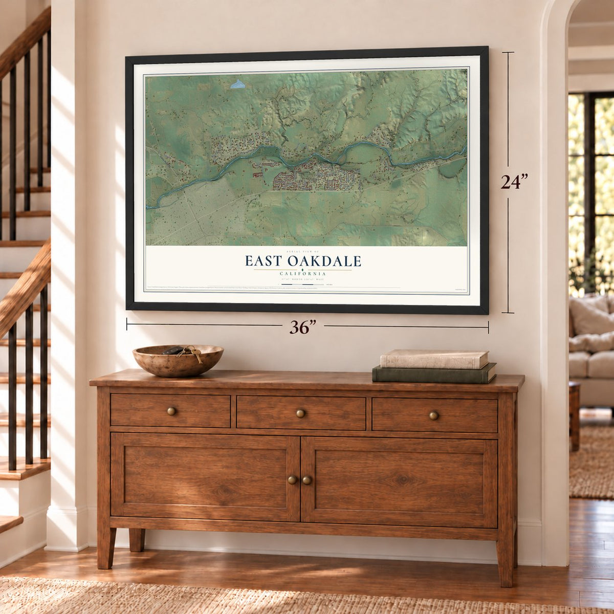 East Oakdale, California map, 24 x 36 inch print in a black frame above a dresser by a staircase