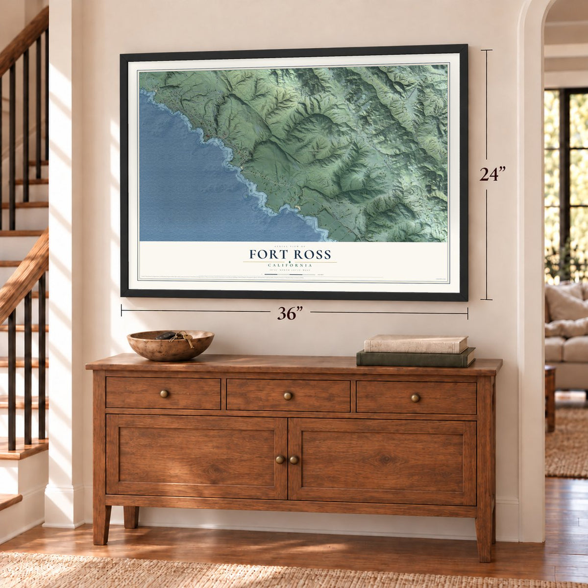 Fort Ross, California map, 24 x 36 inch print in a black frame above a dresser by a staircase