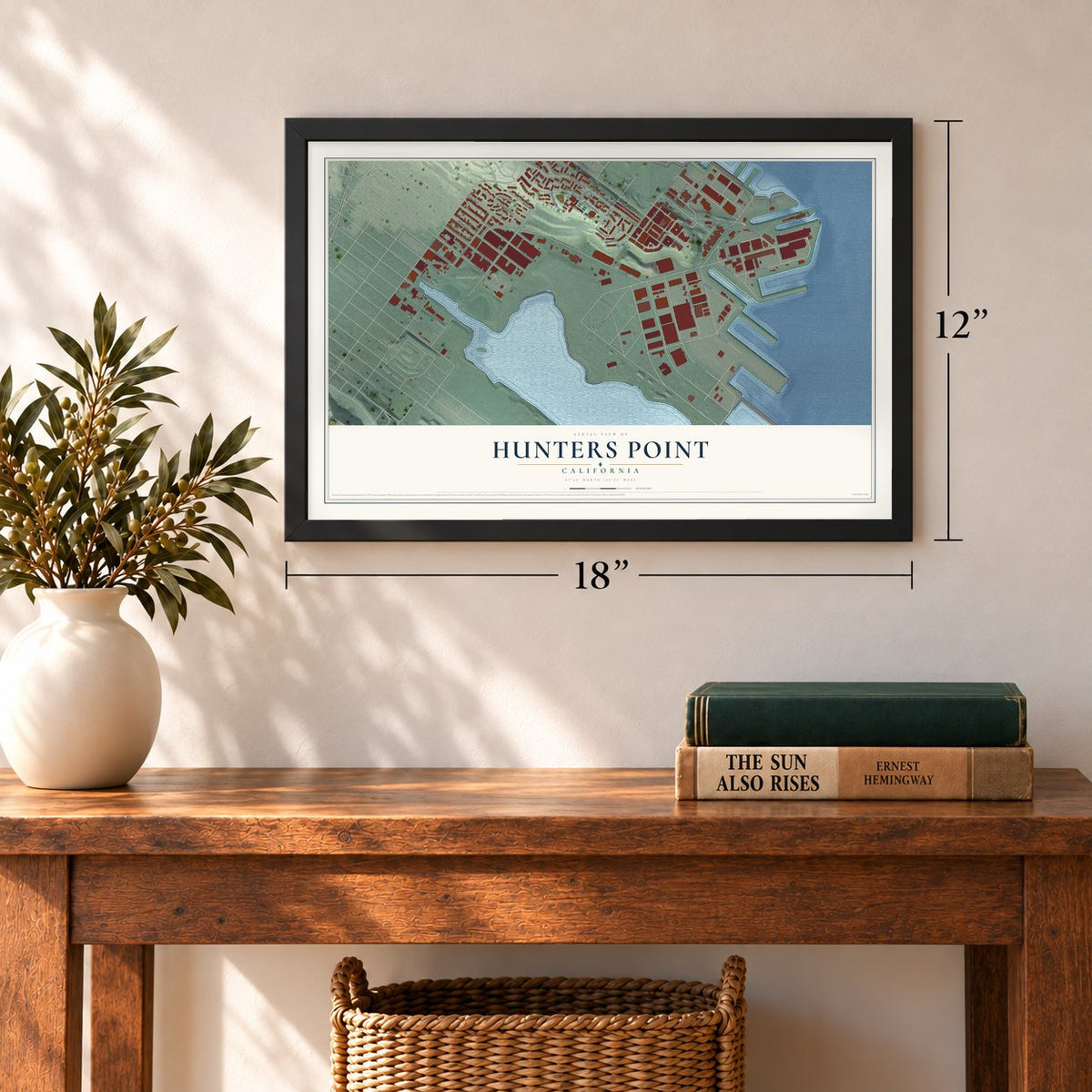 Hunters Point, California map, 12 x 18 inch print in a black frame in an entryway