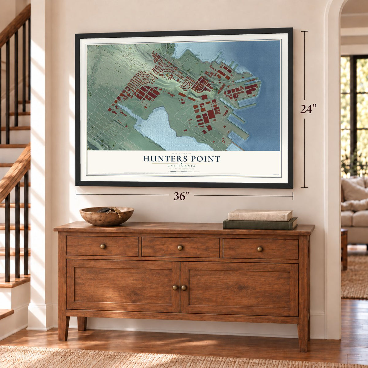 Hunters Point, California map, 24 x 36 inch print in a black frame above a dresser by a staircase