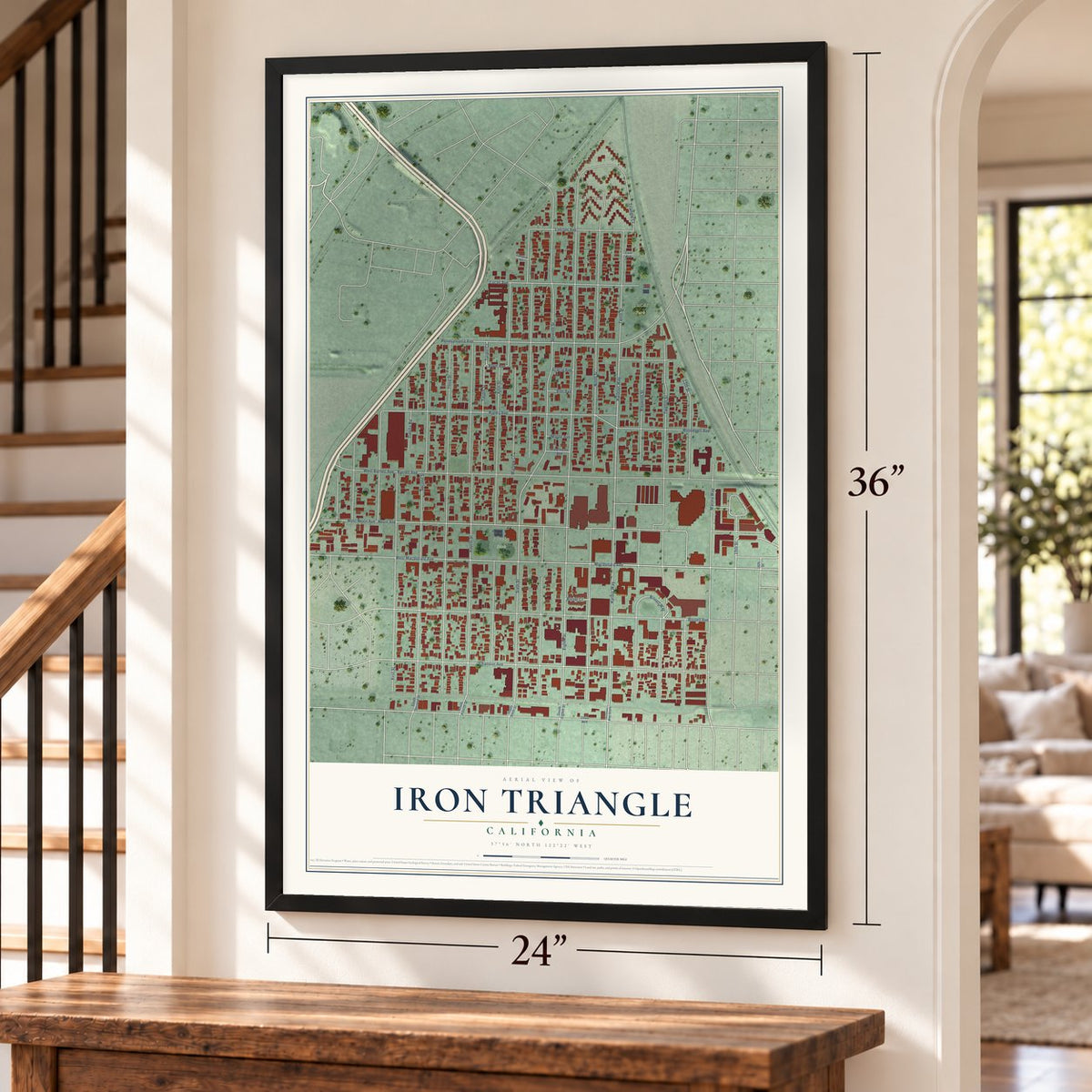 Iron Triangle, California map, 24 x 36 inch print in a black frame by a staircase