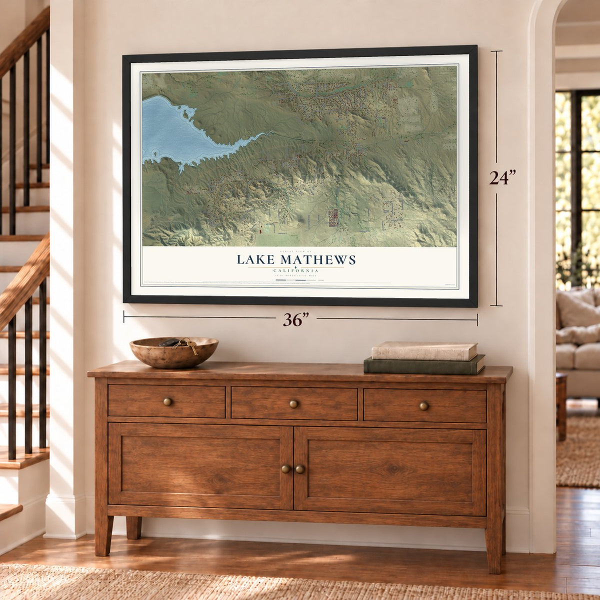 Lake Mathews, California map, 24 x 36 inch print in a black frame above a dresser by a staircase