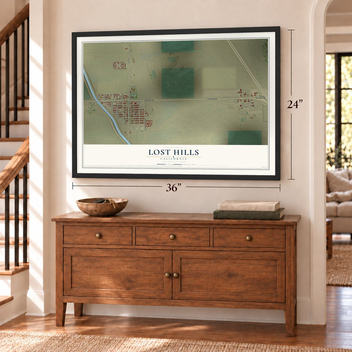 Lost Hills, California map, 24 x 36 inch print in a black frame above a dresser by a staircase