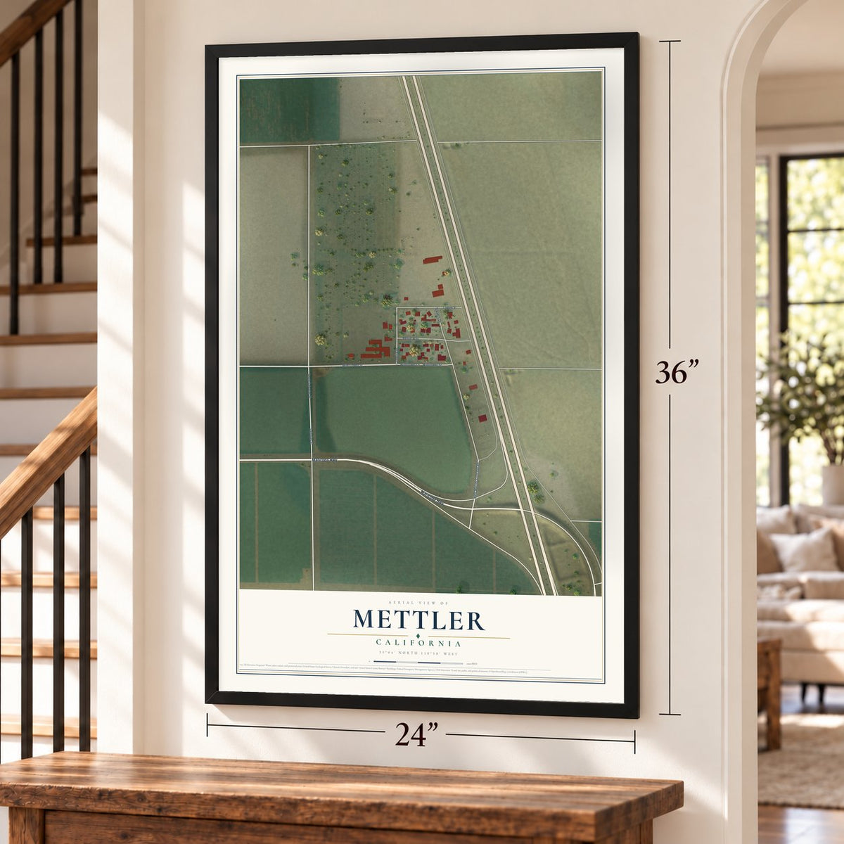 Mettler, California map, 24 x 36 inch print in a black frame by a staircase