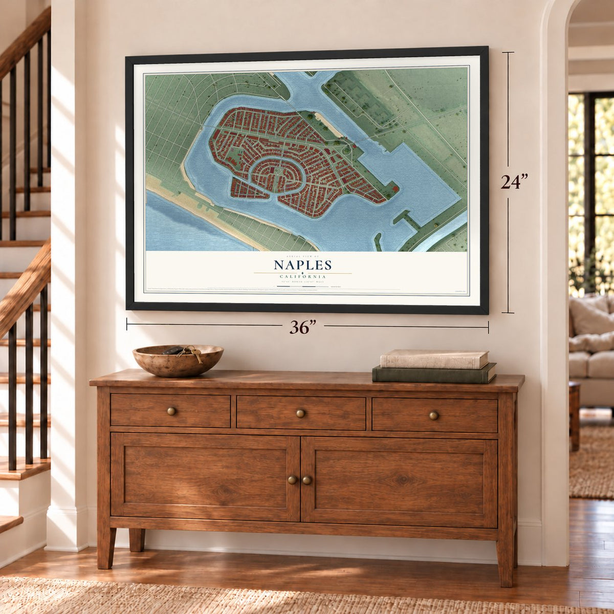 Naples, California map, 24 x 36 inch print in a black frame above a dresser by a staircase