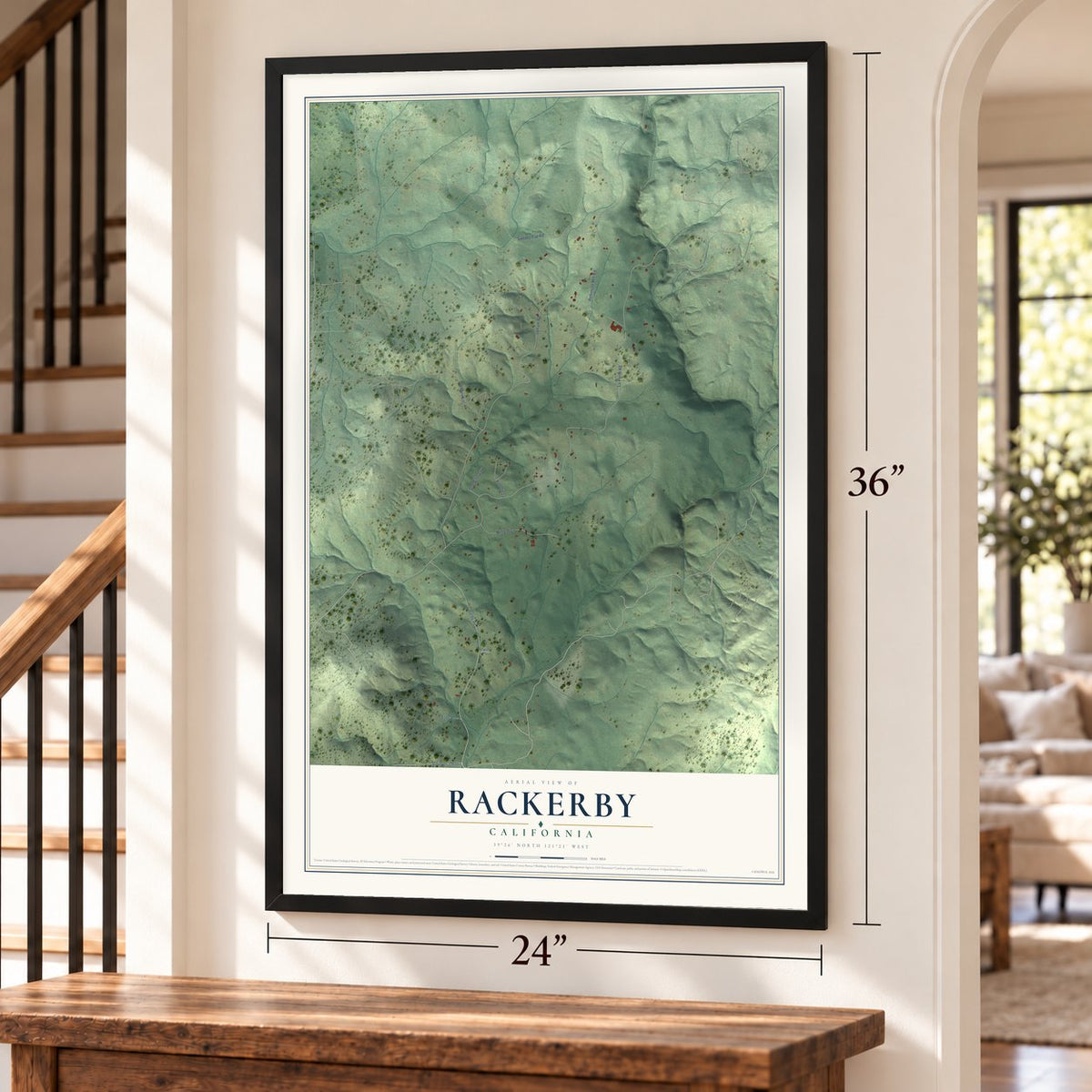 Rackerby, California map, 24 x 36 inch print in a black frame by a staircase