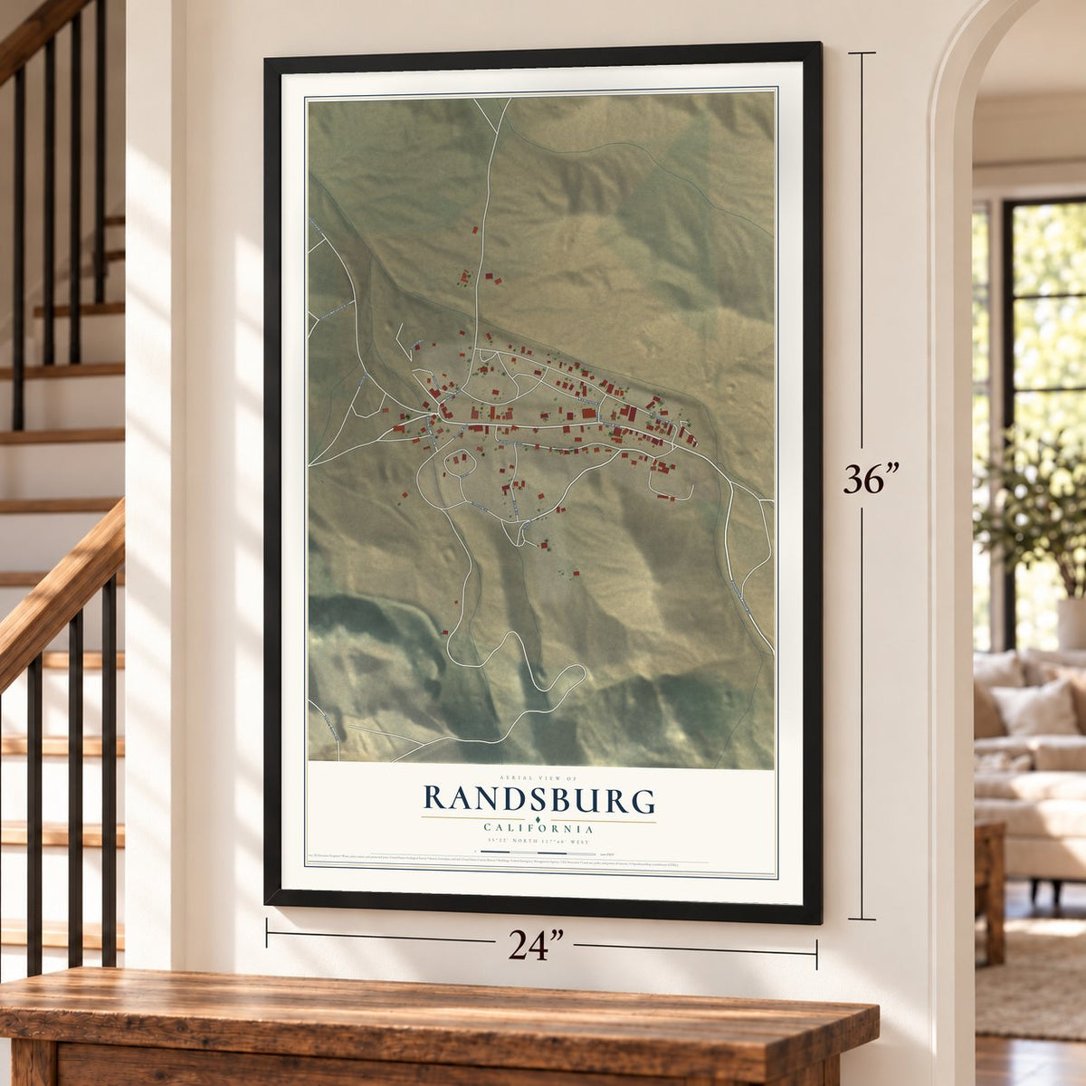 Randsburg, California map, 24 x 36 inch print in a black frame by a staircase