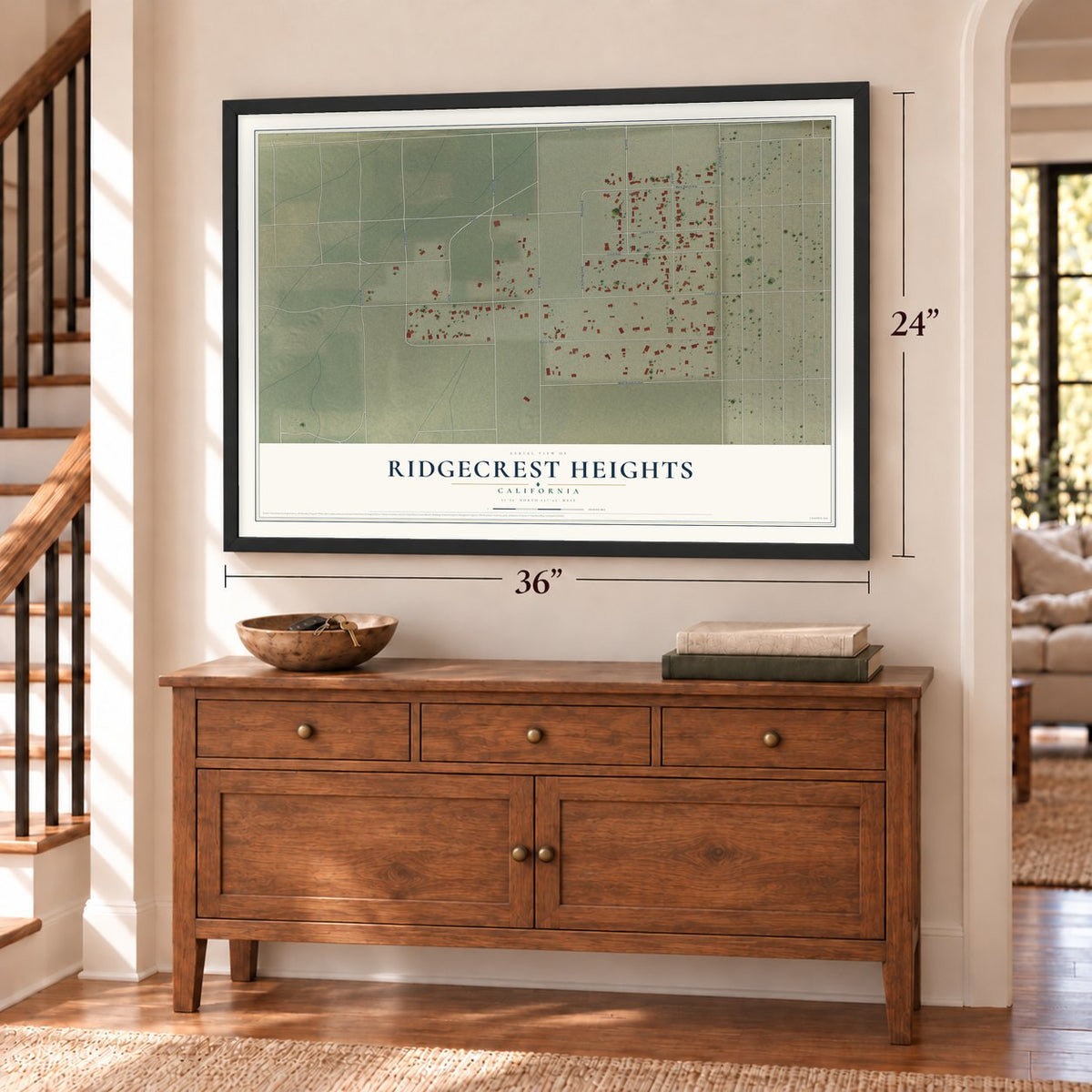 Ridgecrest Heights, California map, 24 x 36 inch print in a black frame above a dresser by a staircase
