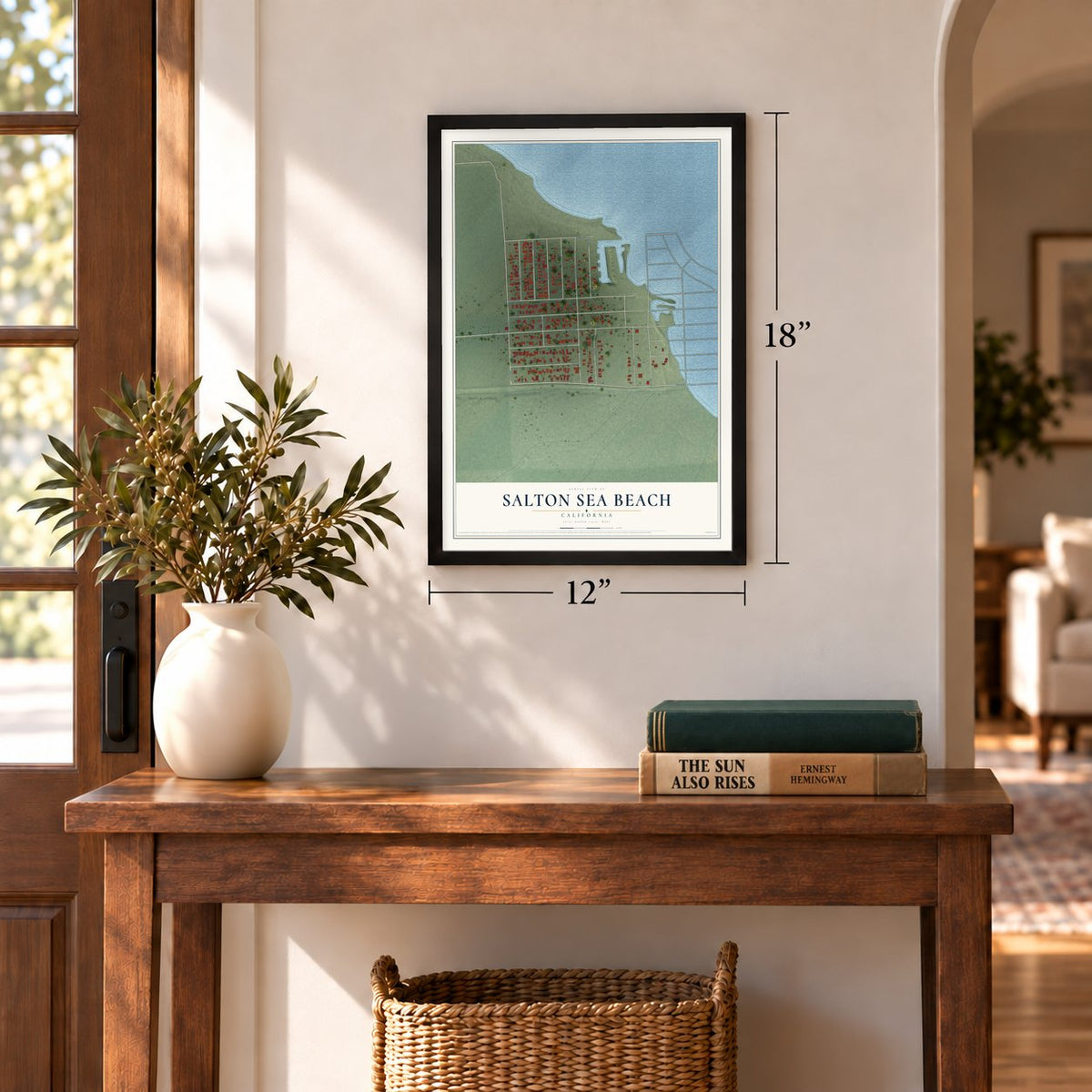 Salton Sea Beach, California map, 12 x 18 inch print in a black frame in an entryway