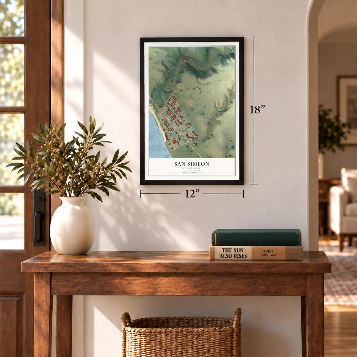 San Simeon, California map, 12 x 18 inch print in a black frame in an entryway