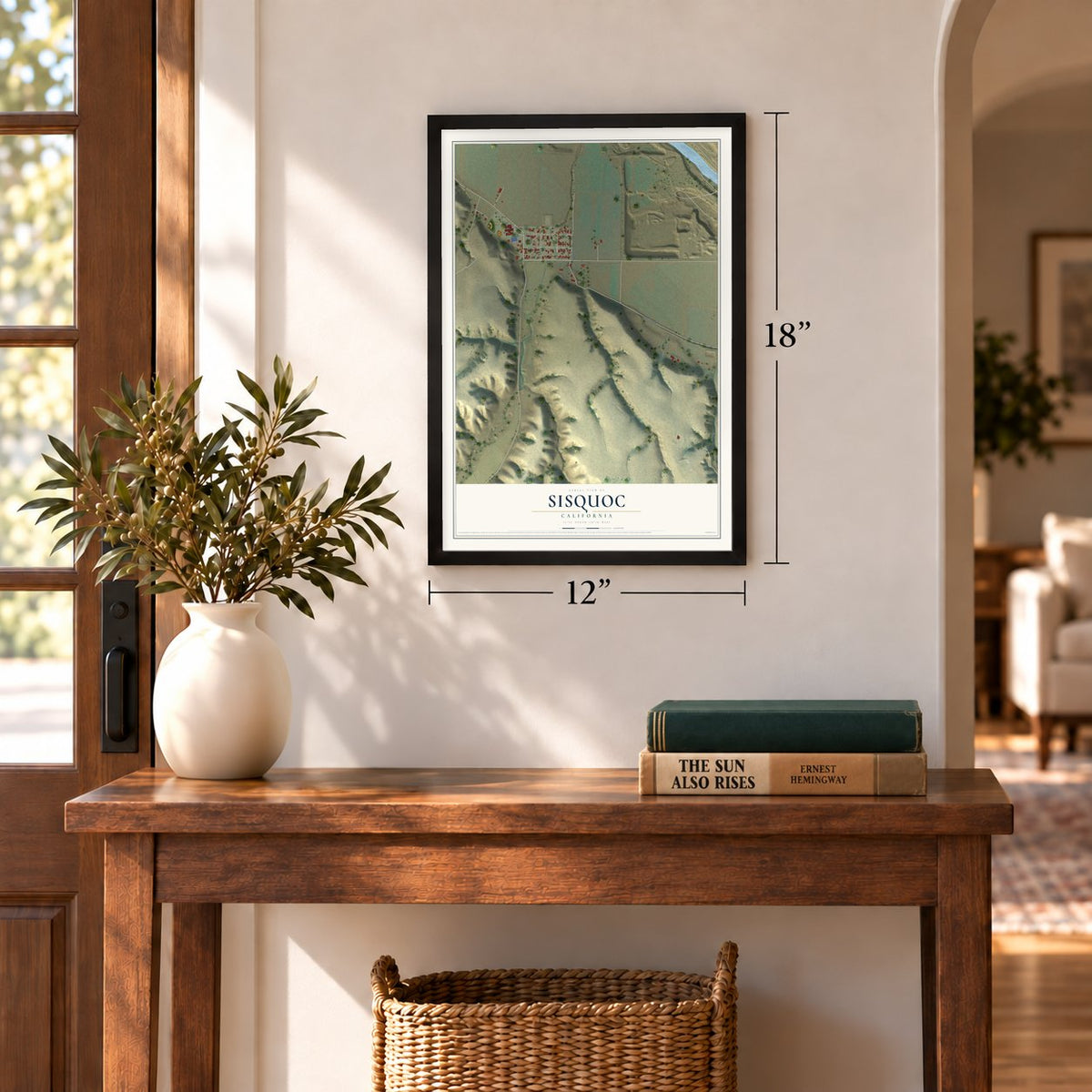 Sisquoc, California map, 12 x 18 inch print in a black frame in an entryway