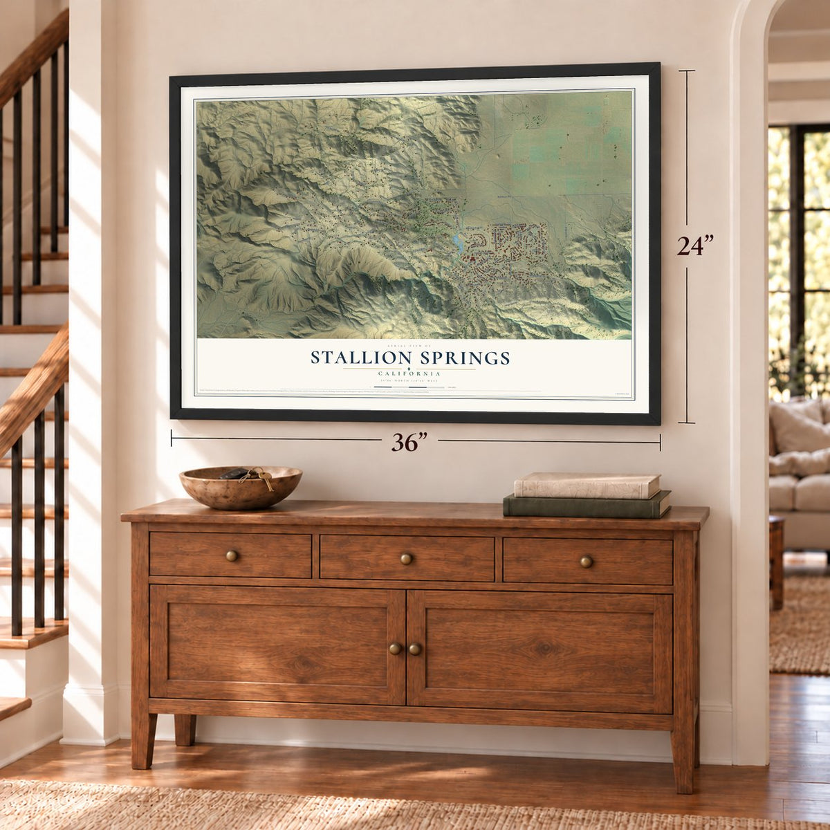 Stallion Springs, California map, 24 x 36 inch print in a black frame above a dresser by a staircase
